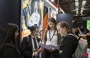Apprenticeship ambassador talking to others.