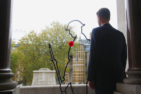 Landscape of Jeremy Hunt beside an outline of a soldier from WW1
