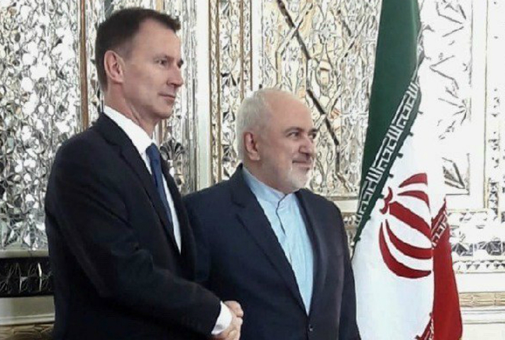 Jeremy Hunt shaking hands with Iranian Foreign Minister