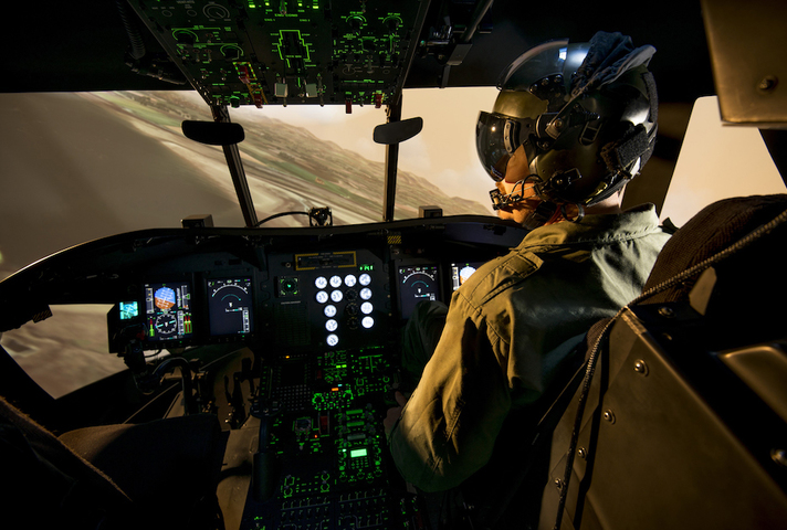 RAF pilot using the Chinook training system