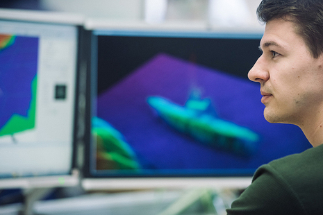 UKHO staff member analysing bathymetric data of a shipwreck