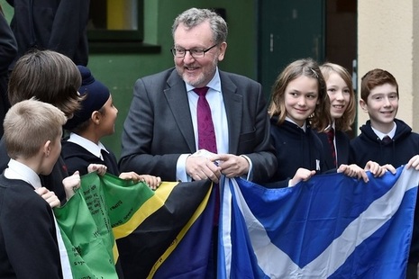 Scottish Secretary visits school in Edinburgh to hear about their partnership with Tanzanian schools.