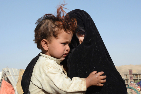 A woman and child displaced by drought in Afghanistan. Picture: OCHA/Philippe Kropf