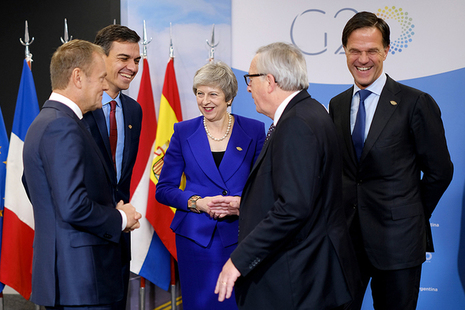 Prime Minister Theresa May laughing with other European leaders at the G20 Summit in Argentina
