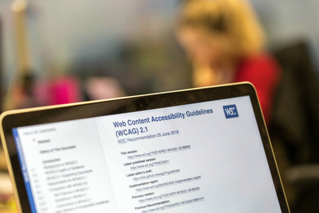 A laptop screen showing the Web Content Accessibility Guidance website