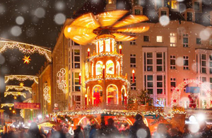 Snowy Christmas scene with merry go round