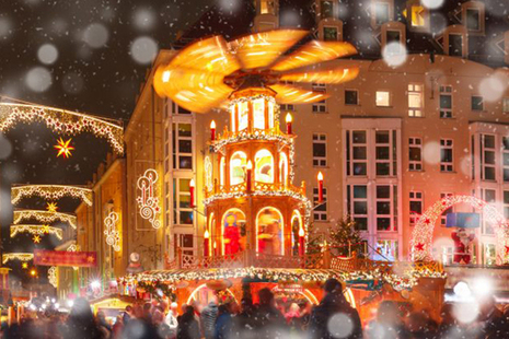 Snowy Christmas scene with merry go round