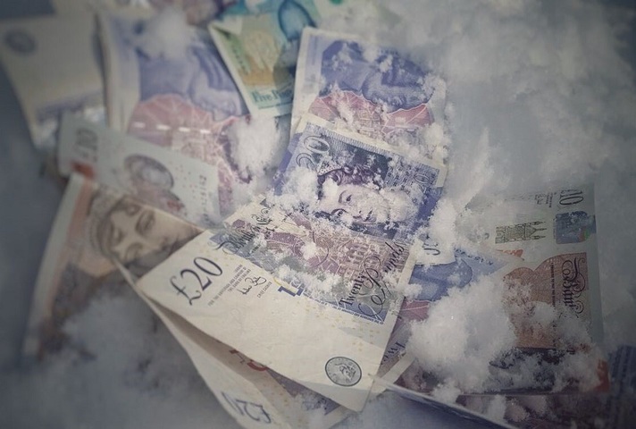 Money frozen in snow