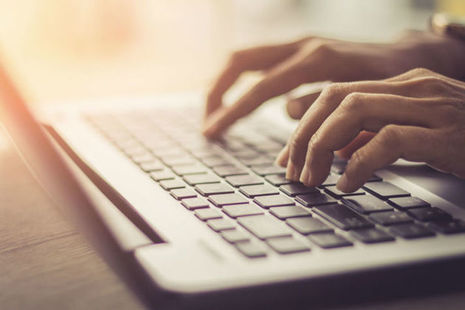 hands on a keyboard