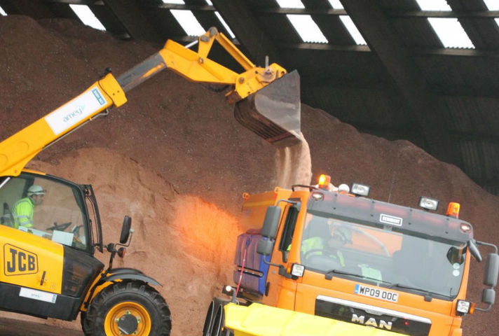 Salt being loaded onto a gritter