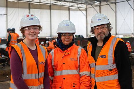 Three trainee archaeologists in high vis, working on HS2 projects
