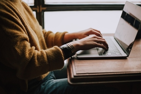 Person sat at laptop