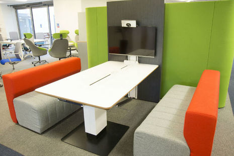 A workspace at the Defence Science and Technology Laboratory set out according to Smarter Working principles
