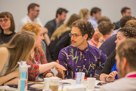 People greet each other at a Digital, Data and Technology (DDaT) Fast Stream induction event