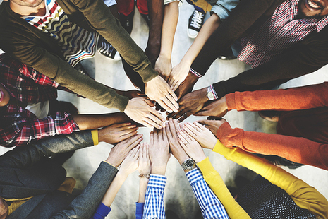 picture of hands together in a circle