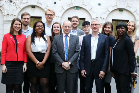 Sir Andrew Dilnot (front row, third from left), standing alongside Deputy Chair Nigel Clifford and 10 other members of the Geospatial Commission
