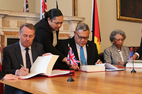 International Trade Secretary signs a trade continuity agreement with the High Commissioners of Fiji and Papua New Guinea