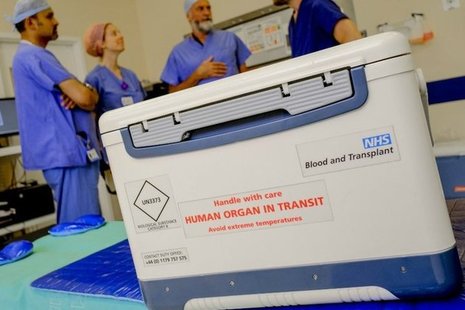 Transplant box in hospital reading 'Human Organ in Transit'
