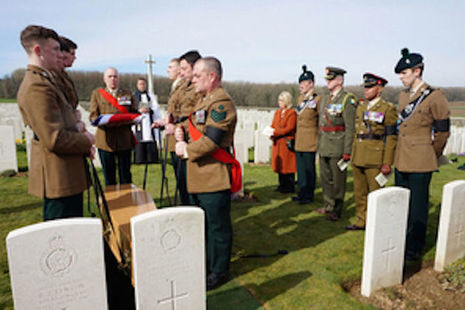 The bearer party from The Royal Irish Regiment, led by WO2 Gary Wilkins, lower the coffin (taken at the Wednesday 20 March service)
