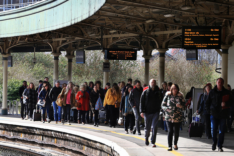 Picture of passengers at Bristol train station.