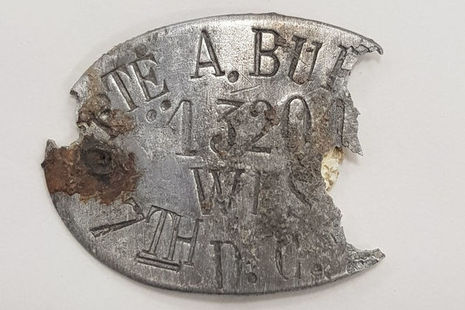An ID tag that was found with the remains that helped the JCCC identify Pte Burt’s remains, Crown Copyright, All rights reserved