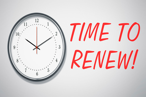 Clock on wall and text saying time to renew