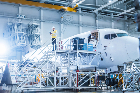 An engineer inspecting an aircraft