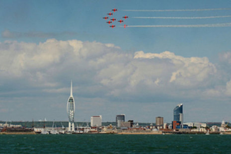 The Red Arrows fly over Spinnaker Tower in Portsmouth.