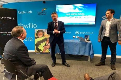 Dr Liam Fox listening to a presentation from Sure Chill