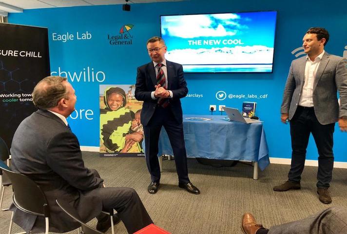 Dr Liam Fox listening to a presentation from Sure Chill