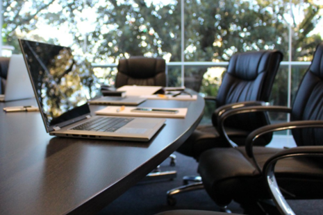 Board room with laptops