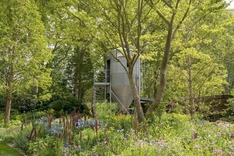 Photograph of the Resilience Garden showing silo, trees and other plants