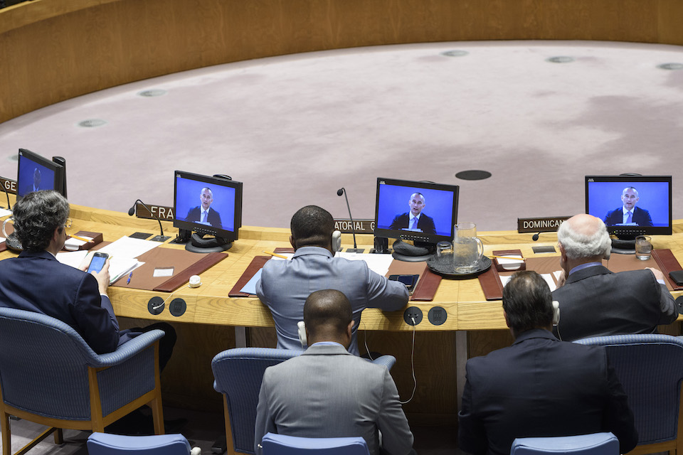 Nickolay Mladenov (on screens), Special Coordinator for the Middle East Peace Process and Personal Representative of the Secretary-General, briefs the Security Council on the situation in the Middle East, including the Palestinian question. (UN Photo)