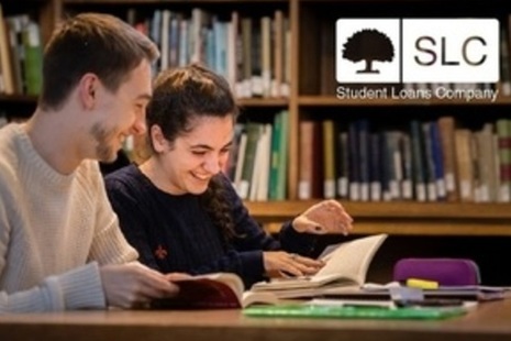 Image of: students at desk with slc logo