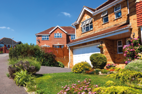 Modern English brick house and garden