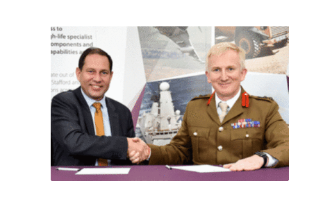DECA Chief Executive, Geraint Spearing shaking hands with Colonel Nick Lock Deputy Commander 160 Brigade during the signing event