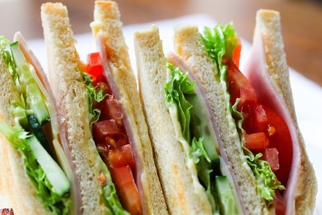 Ham, cheese and salad sandwiches cut into triangles
