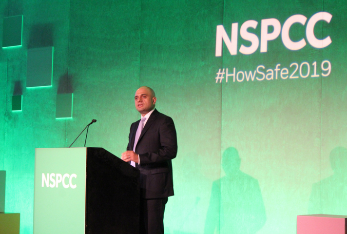 Home Secretary delivering a speech.