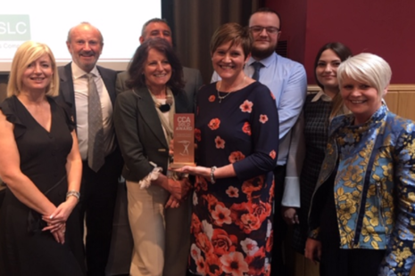 SLC staff being given a CCA gold award