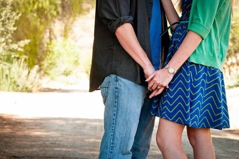 Couple holding hands