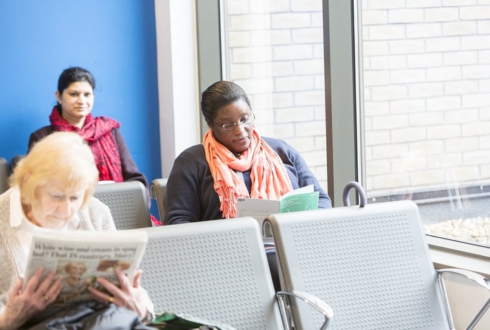 Female patients sitting in waiting room
