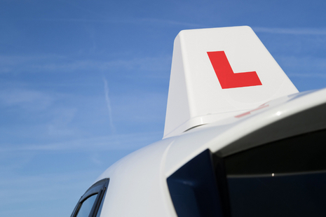 Photo of a driving school car with L plates