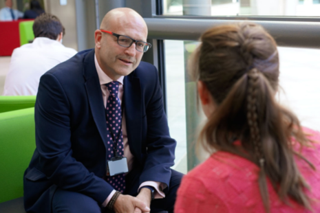 Photograph of Paul Harris being interviewed