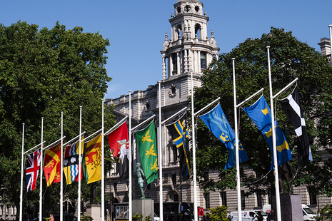 County flags flying at Parliament Square, London