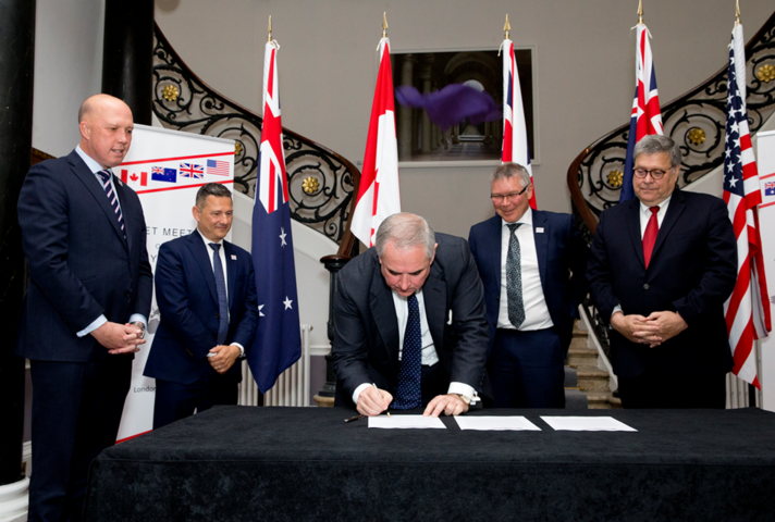 Attorney General Geoffrey Cox QC MP signing the Statement