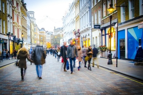 People walking down a street.
