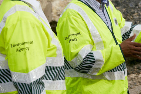 Close up of EA staff in hi-vis vests