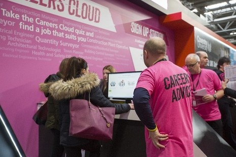 Image of staff from the National Careers Service giving advice to young people.