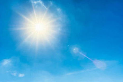 The sun in a blue sky