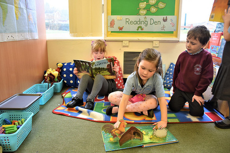 Reception pupils reading